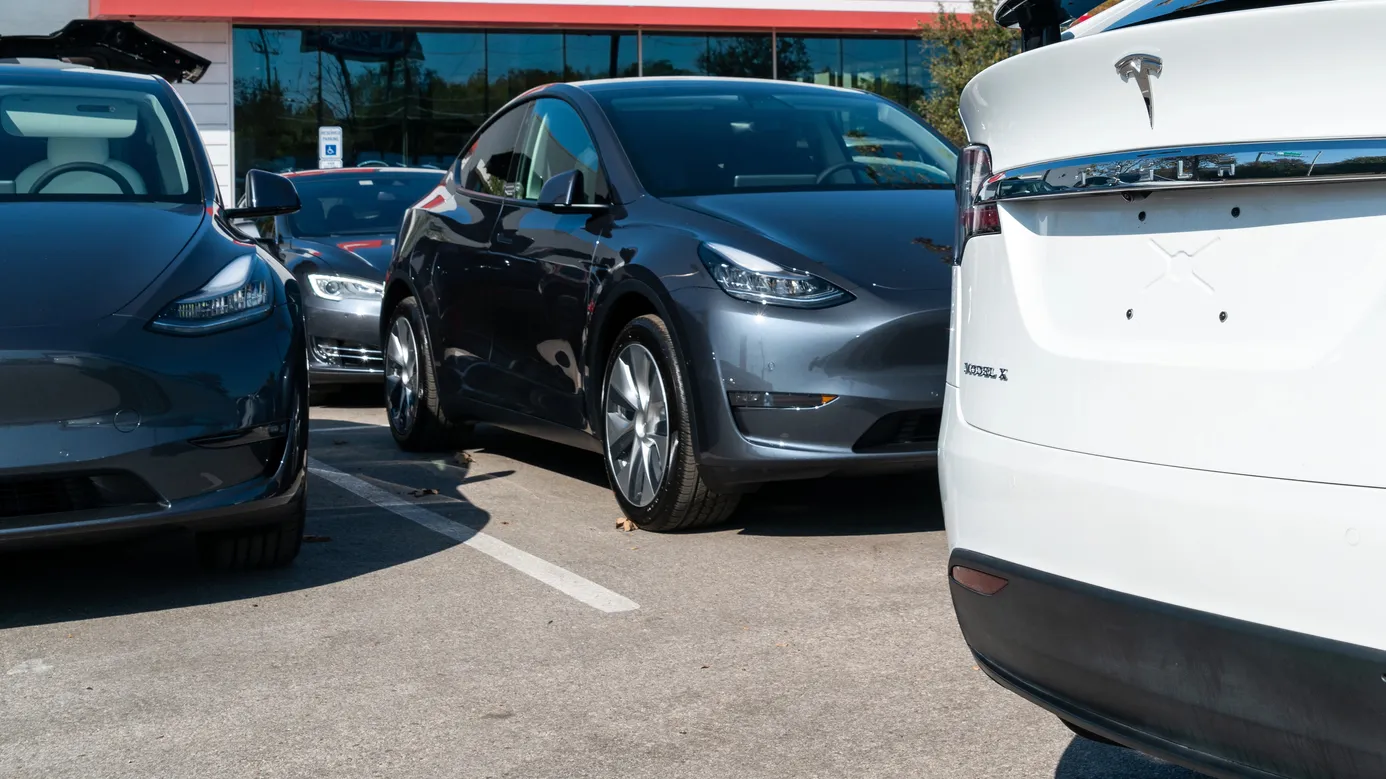 Tesla  models parked in a lot