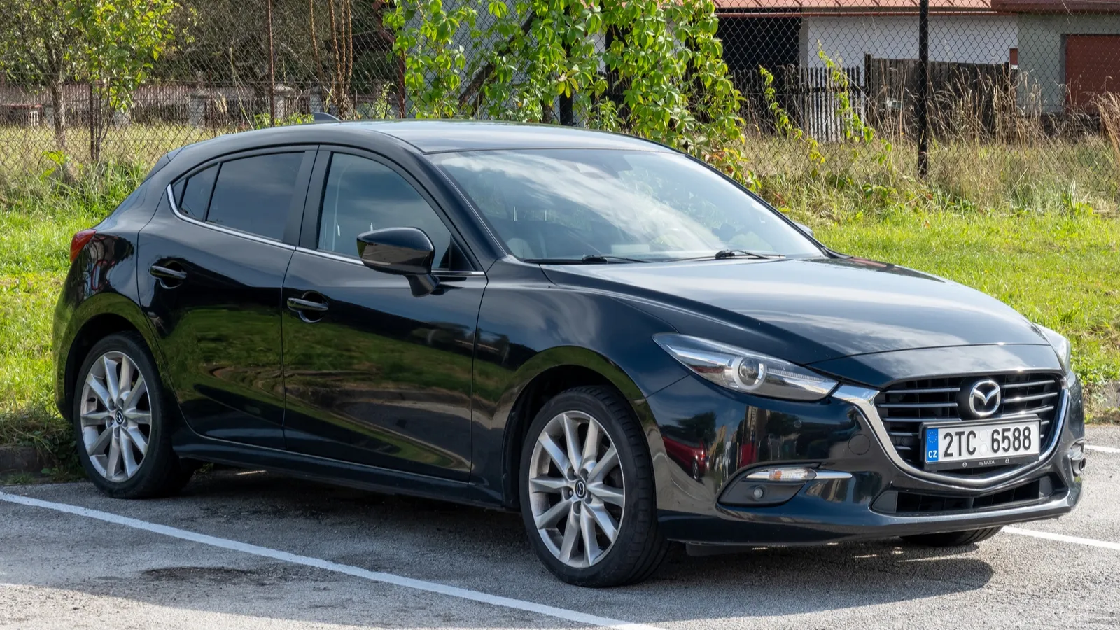 Black Mazda 3 hatchback
