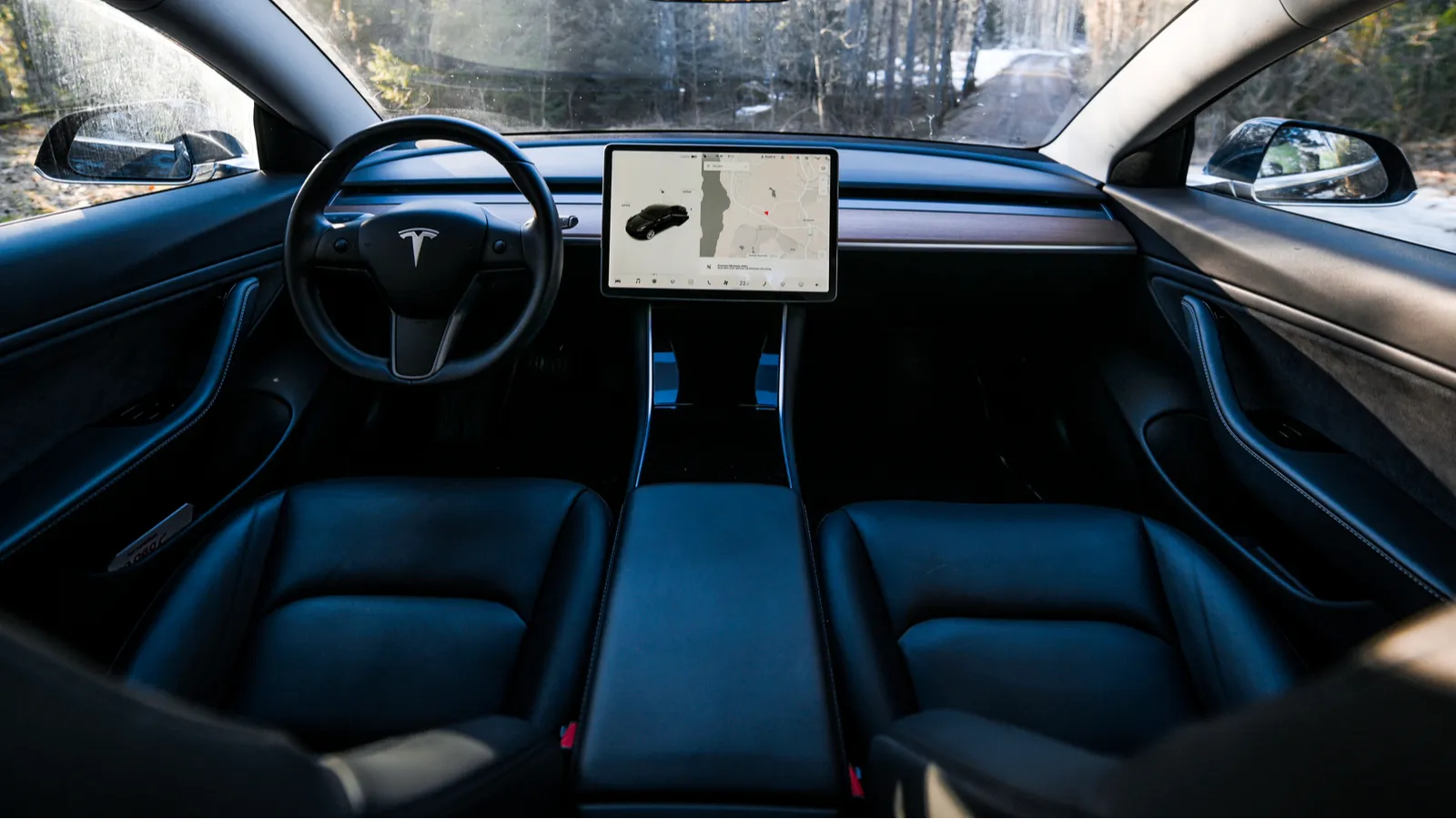 Black Tesla Model 3 interior cockpit 