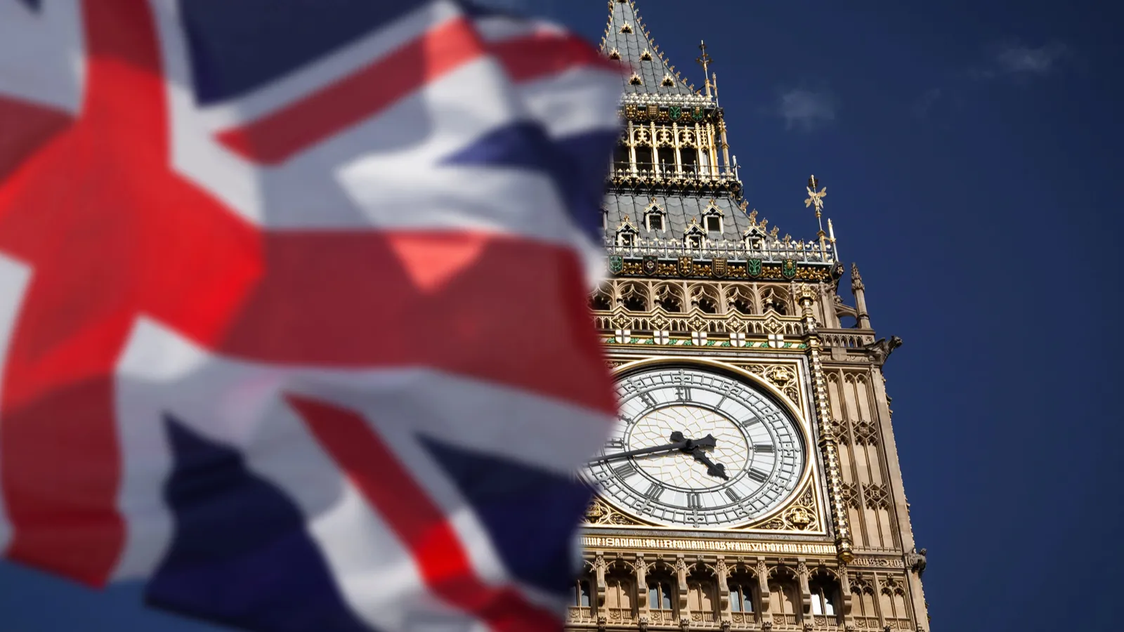 UK flag with clocktower at back