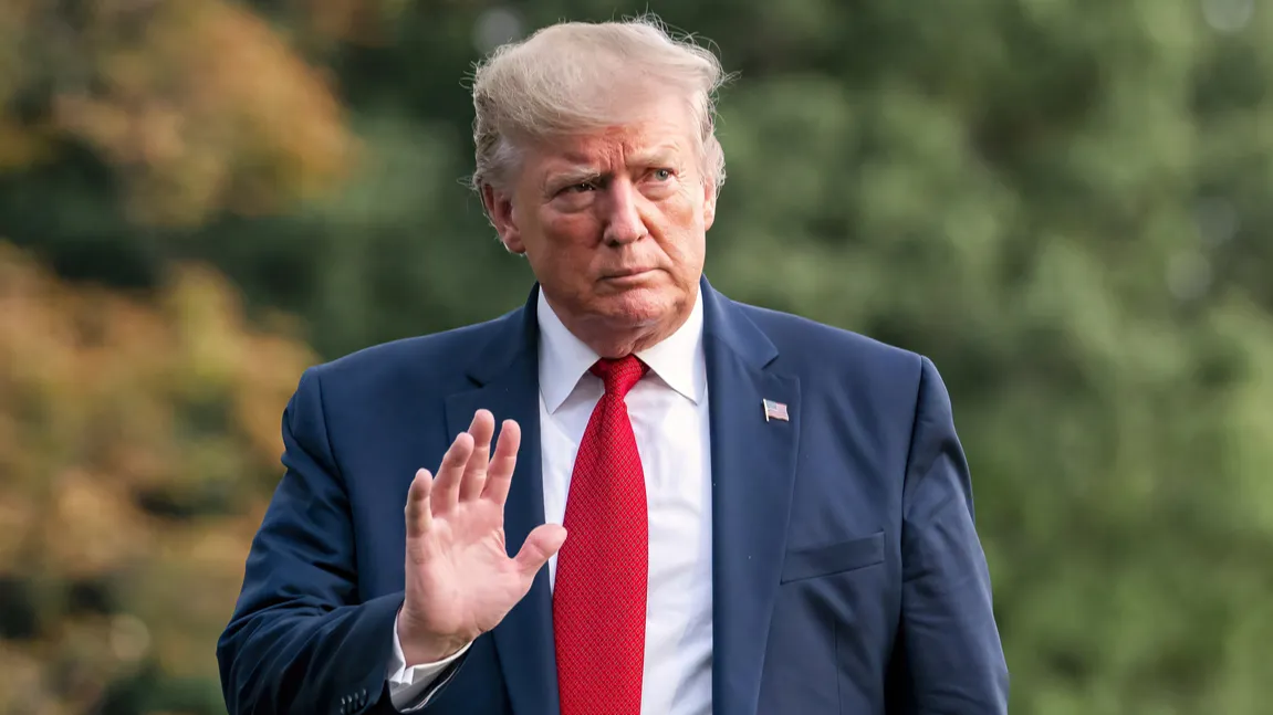 Shot of US president Donald Trump waving.   