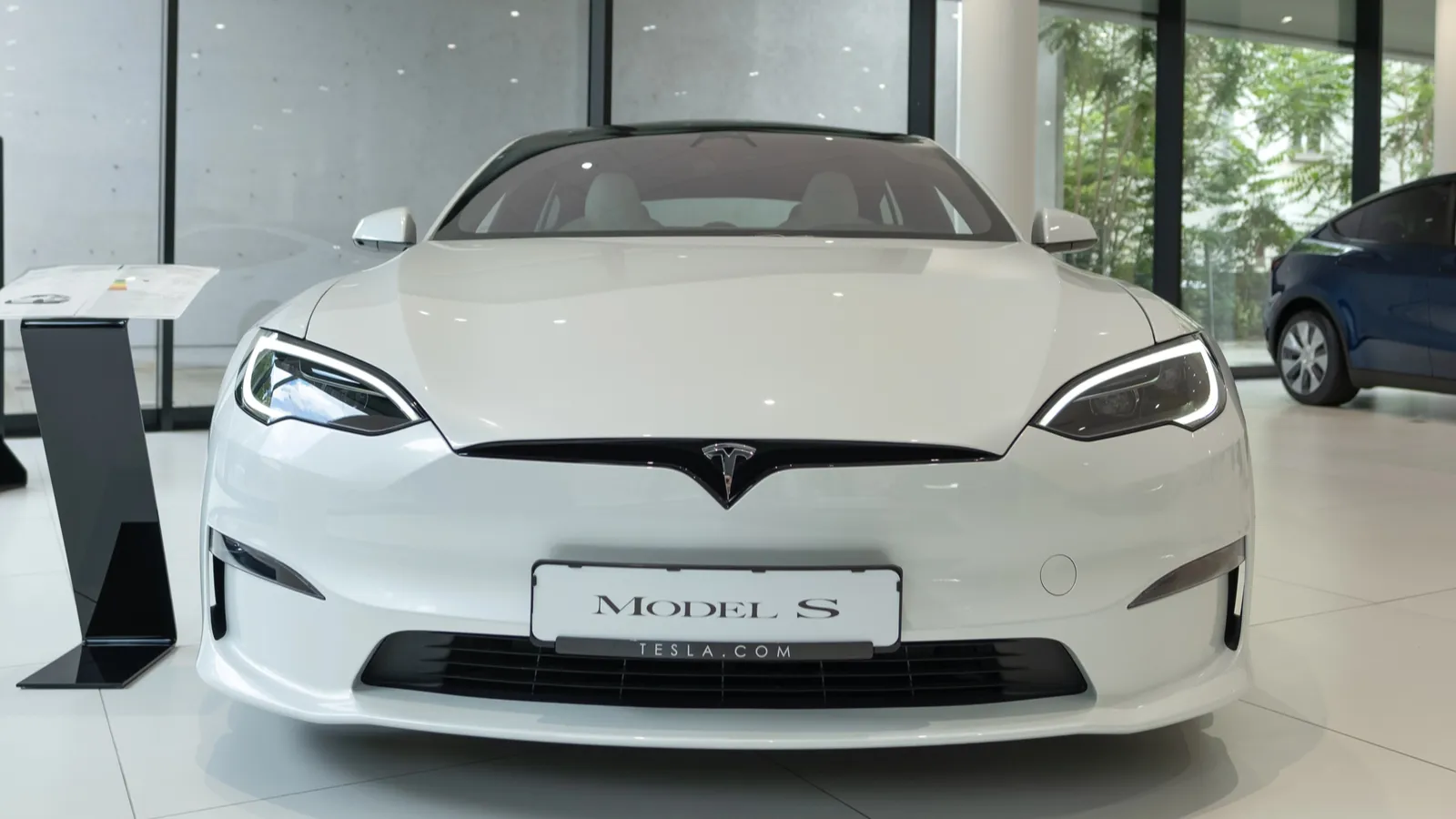 White Model S plaid innovative electric car at Tesla motors