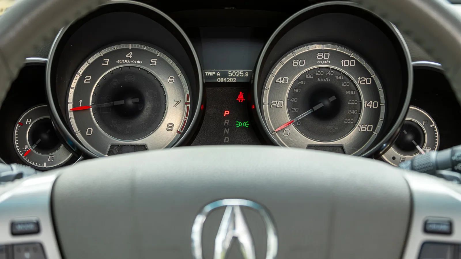 Acura steering wheel and speed o meter cluster 