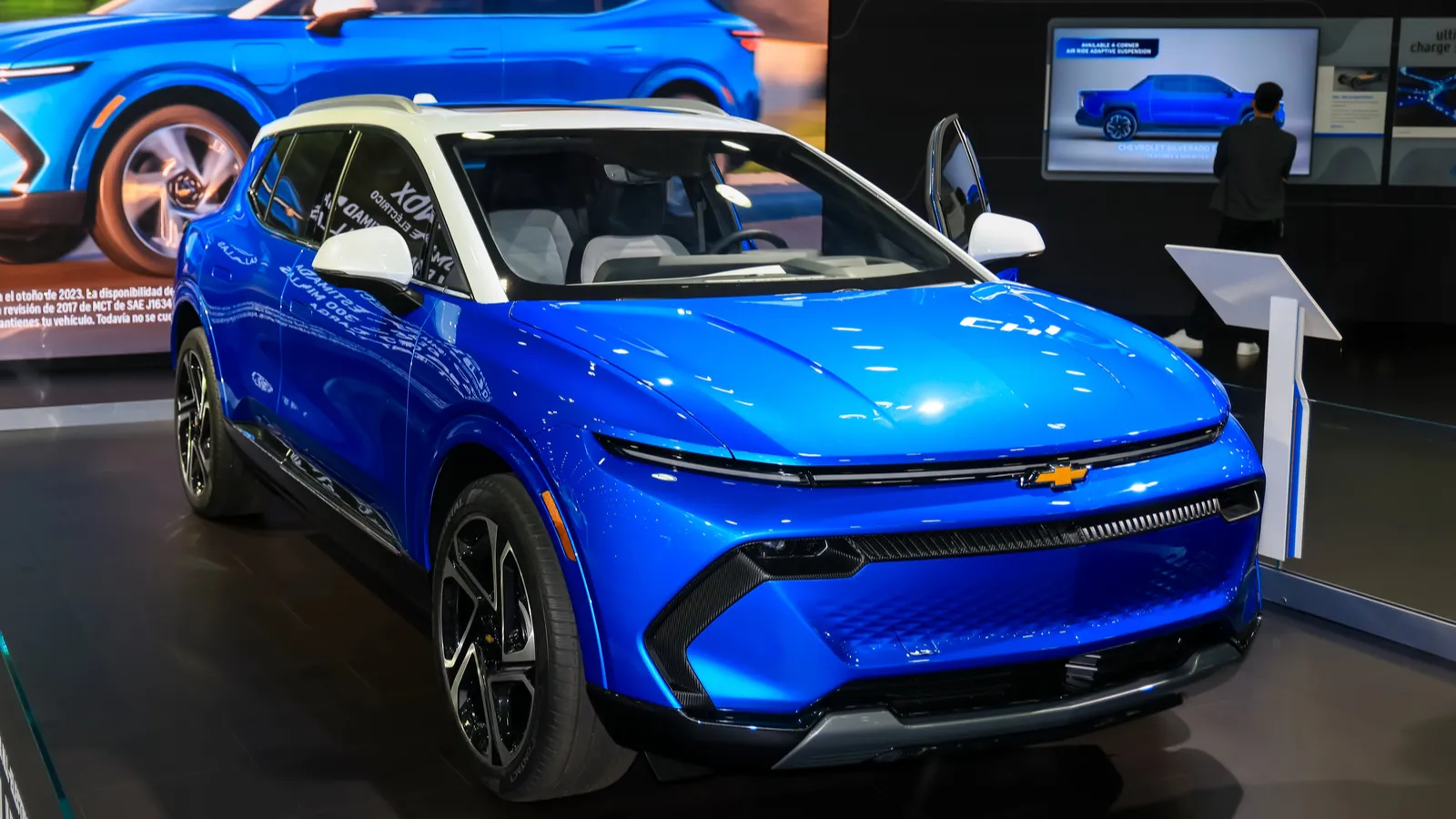 Blue Chevy Equinox EV displayed at a showroom