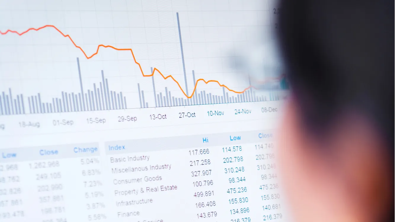 Cropped view of person watching stock drop.