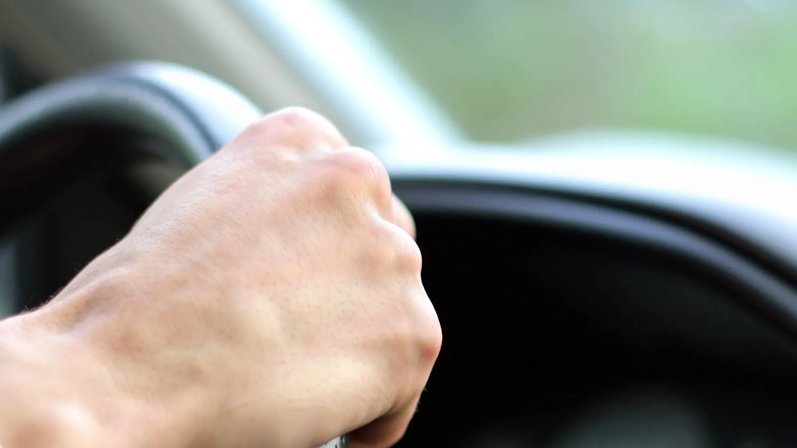Man driving a car