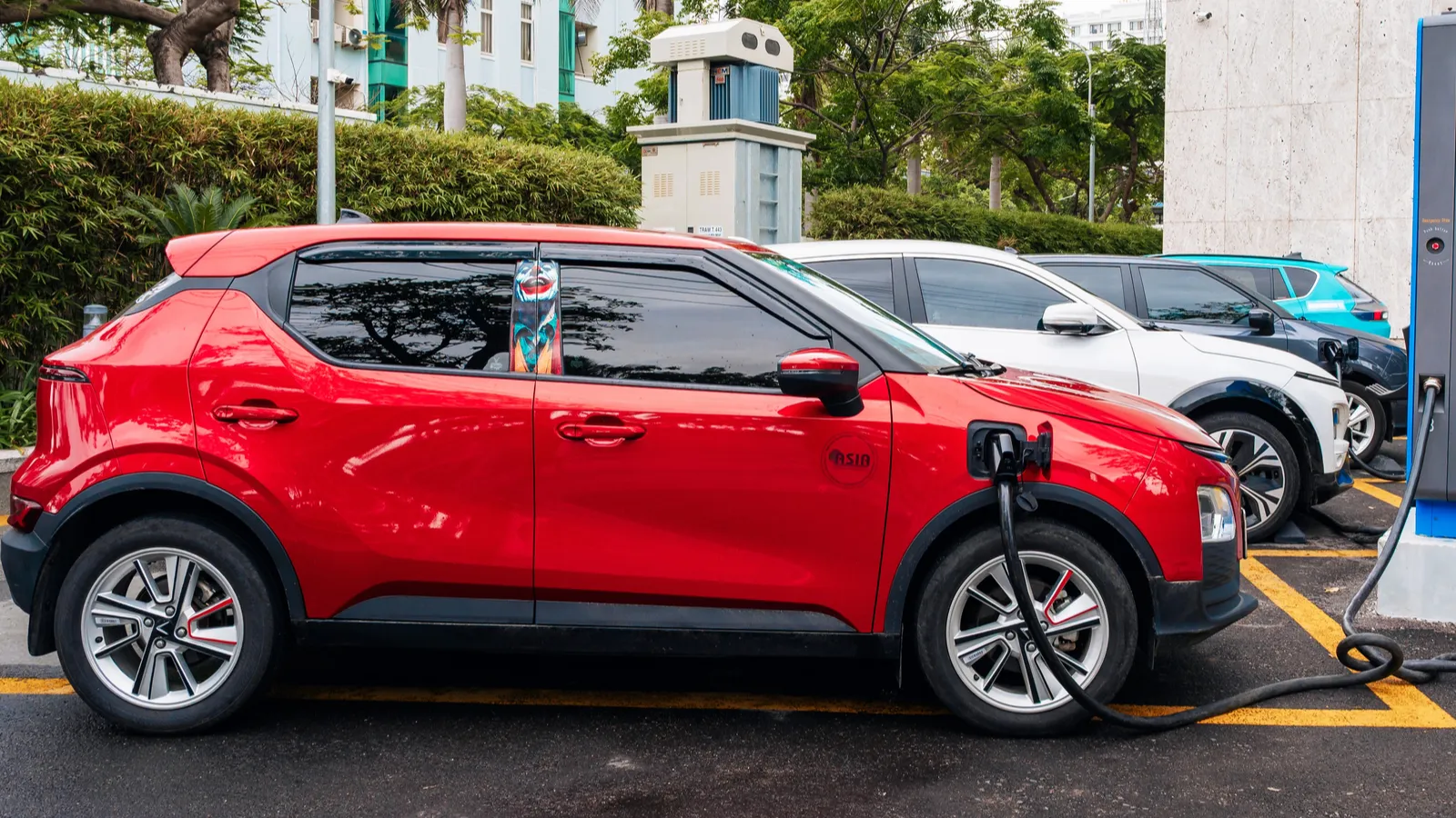 Modern Vietnamese VinFast electric cars at a charging station