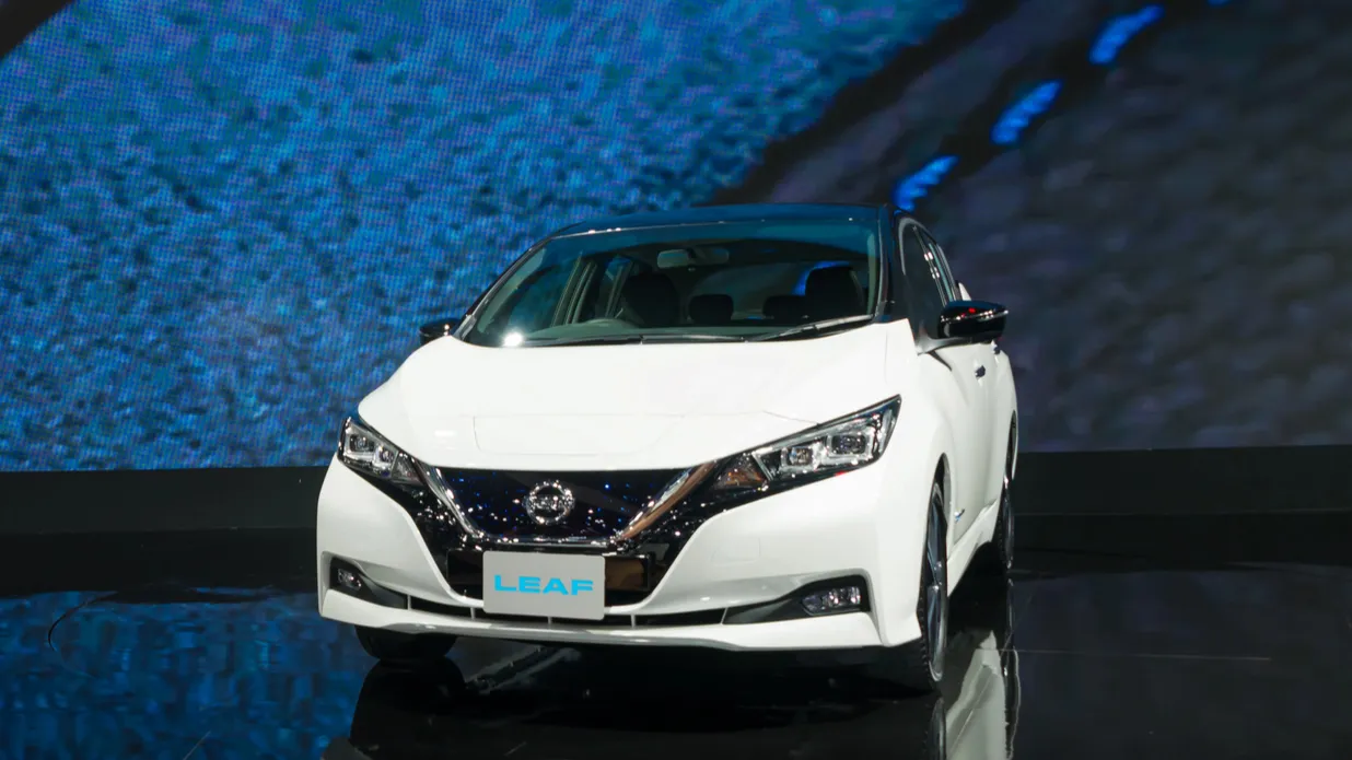 White Nissan Leaf displayed at a show